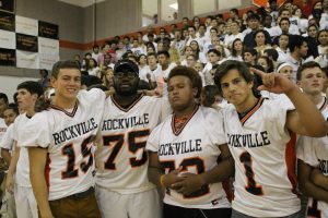 (Left to right) Senior football players, Brandon Geddes, Manny Essien, Brandon Taylor and Erik Blautzik pose for a picture. 