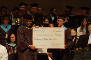 Special guest Gregory Prince receives a check from RHS that will go towards the Madison House Autism Foundation.