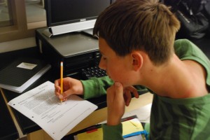 Sophomore Kellen Cremins works on his classwork in his tech class.