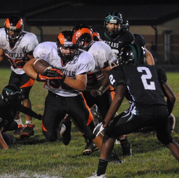 The Rams won their first game in over two years with a trilling victory over rival Northwood HS. Junior running back Cristian Maldonado breaks through the line of scrimmage as he avoids a Tuscarora tackle.