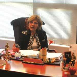 Munk sitting at her desk during the school day. Adam Bensimhon