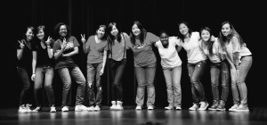 Members of the Asian American Club pose onstage after a performance at International Night May 3. This night is an annual event at RHS where students can celebrate their heritage, bring in traditional foods and perform. --Courtesy of Stephan Han