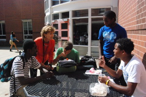 New Principal Billie-Jean Bensen talks with students outside the school building during lunch. Bensen has been working to become more familiar with the many faces of RHS. --Mercy Fosah