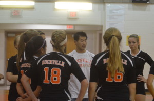 Varsity volleyball coach Sean Pang motivates the team during a match against Gaithersburg High school Sept. 24. The Lady Rams look to catch their stride in their upcoming matches and gain momentum going into their final stretch of the season. --Adam Bensimhon