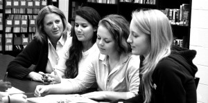 Ainsworth helps IB seniors (left to right), Michele Siqueira, Cassidy Lankler and Clare Sarsony on a Theory of Knowledge (TOK) project. Ainsworth's brings extensive teaching experience to RHS. --Adam Bensimhon Ainsworth helps IB seniors (left to right), Michele Siqueira, Cassidy Lankler and Clare Sarsony on a Theory of Knowledge (TOK) project. Ainsworth's brings extensive teaching experience to RHS. --Adam Bensimhon