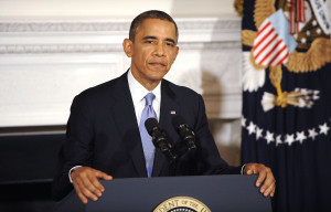 President Barack Obama pauses as he speaks about the reopening of government following the shutdown during a news conference in the State Dining Room of the White House in Washington, Thursday, October 17, 2013. Courtesy of MCT Campus