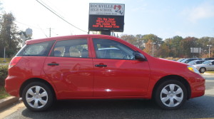 A student's car is parked in front of the RHS electronic sign that reads a message about the new law requiring cellphones to be hands free in the car. Students will be reminded of the law as they enter and exit the parking lot. --Adam Bensimhon