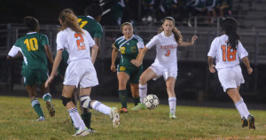 Junior Sophia Dillon cuts off a defender in a regular season game vs. Seneca Valley HS , who they later beat in the first round of playoffs.