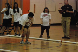 Senior Julia Ramos takes her turn during the team's match against Wotton HS on Jan 8. The team won the match 2-1 to complete their 3-0 win streak. The team's upcoming matches are against Magruder and Richard Montgomery. --Meklit Bekele