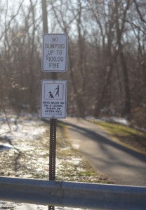 Rock Creek Park displays signs that warn of the possible $100 fine for littering on the grounds. --Adam Bensimhon