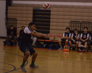 Sophomore Felix Tolentino hits the ball during a match earlier this year. Tolentino is a talented and vital player on the team. --Adam Bensimhon