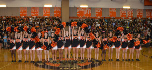 The poms perform their signature move, the worm, at the first pep rally of the year Sept. 5. --Claudia Mirembe