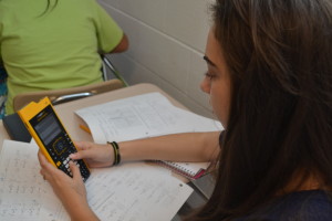 Senior Michaela Berger uses the new TI-Nspire in her AP Calculus BC class. The calculators are available in most math classes, and offer many new features. --Elissa Britt