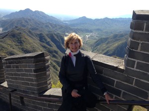 Principal Billie-Jean Bensen stands on the Great Wall of China. Bensen took a week-long trip to exchange ideas about  educational differences. Courtesy of Billie-Jean Bensen