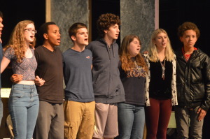 Cast of Rent rehearsing for the performance.