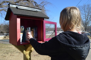 Senior Amy Brantner browses the books in the 