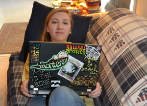 Senior Anna Walker opts to watch a movie on her laptop instead of paying the price at a movie theater. --Thomas Sheil