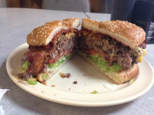 Sunshine's famous bacon cheeseburger moments after coming off the grill. Make sure to check out Sunshine for a great burger, you won't be disappointed! --Alexander Nagy