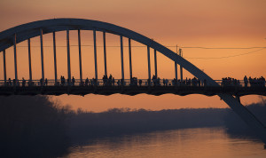 People along the Edmund Pettus Bridge at dusk in Selma, Ala., on Saturday, March 7, 2015. Courtesy of MCT Campus
