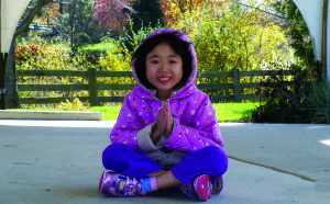 Posing for her family, sophomore Yiching Cheng enjoys Centennial Park in Ellicott City, Md. in October 2009. Yiching's family will remember her as a cheerful and loving daughter and sister. Photo Courtesy of Jamie Cheng.