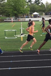 This picture is of Billy Kirk running the 3200 meter race. He finished ninth by a season's best time of 10:02. Courtesy of Yousef Ghanem