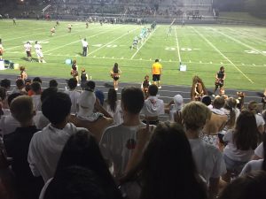 Eager RHS fans watch the first game of the school-year unfold.