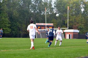 Junior Marlon Ovando anticipates to take control of the ball thrown by Garcia-O'Donnell.