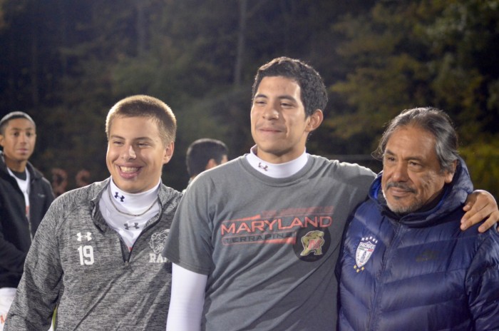 (Left to Right) Junior Thomas Da Silva, Senior Alejandro Beatres, and Coach Julio Zarate pose for a picture.