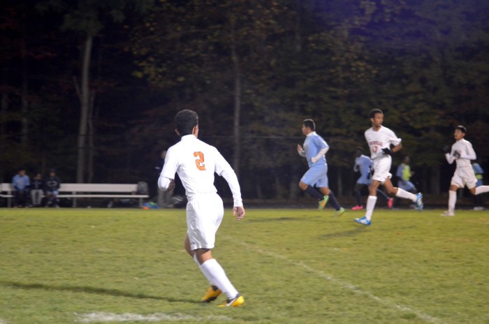 Senior Ronaldo Reyes runs towards the direction the ball is heading,