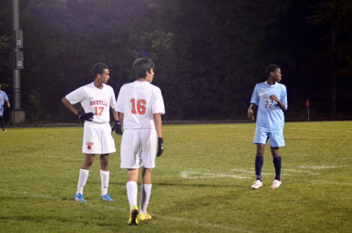 Seniors Emmanuel Benyam and Kevin Pereira watch the action of the game.