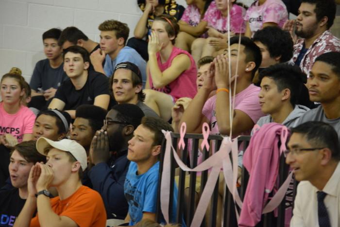 The inferno cheers for RHS lady rams during the volleyball game.