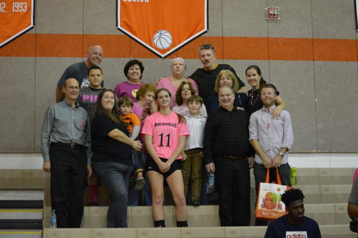 Jones poses with her family after the game. Her mother was diagnosed with breast cancer in May, 2015.