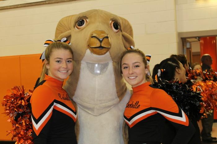  Seniors Skye Nielsen and Erin Moriarty pose with Rammy before the pep rally. 