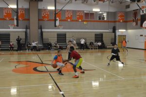 Senior Joel Garrett is guarded by senior Tim Howard