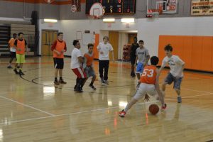 Senior Jack Hegarty is guarded by Bo Walker